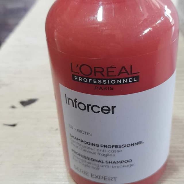 Red, White Shampoo Bottle