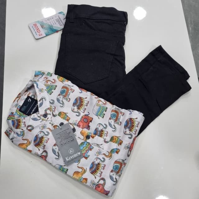 Black and Multicolor Shirt and Jeans