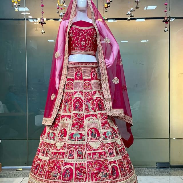 Red, Gold, and touches of other colors Lehenga Choli