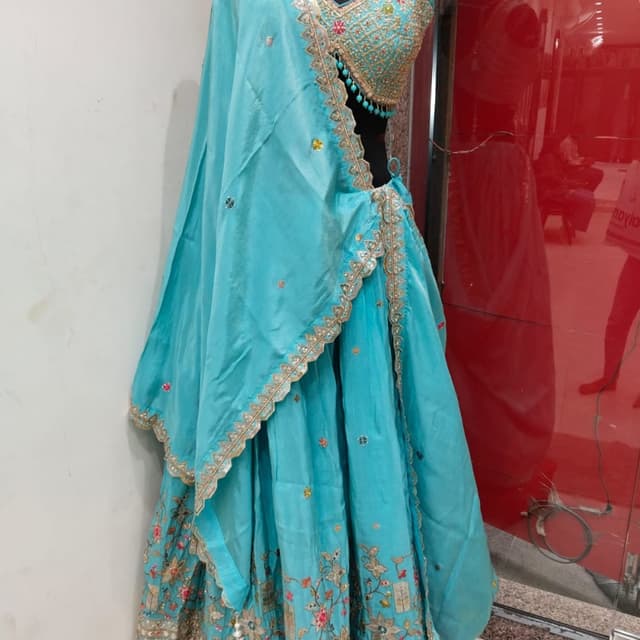 Turquoise, Gold, and Multi-color accents Lehenga Choli