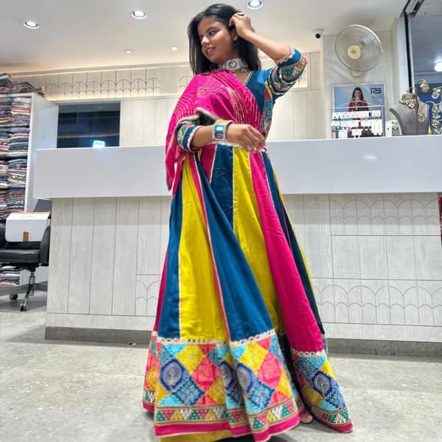 Pink, Yellow, Teal, and accents of gold Lehenga Choli