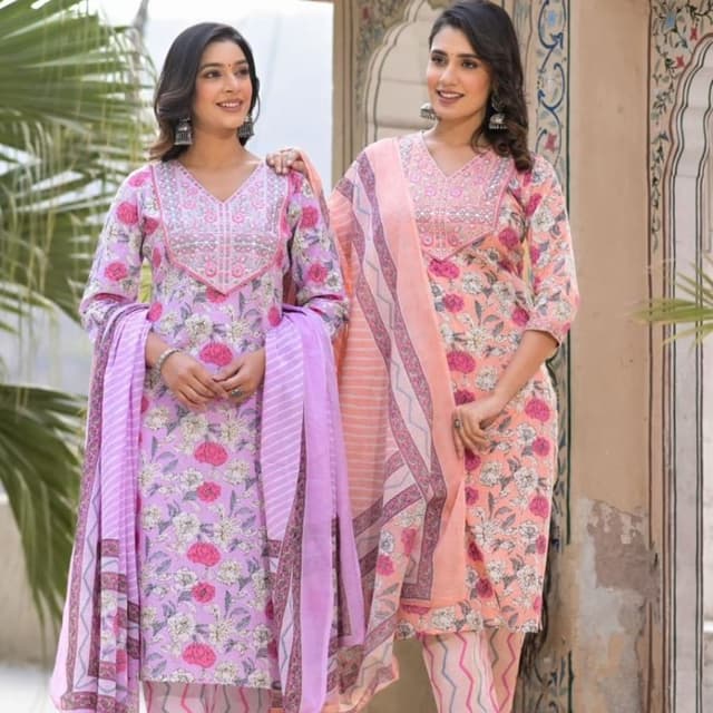 Various shades of pink, purple, and white Salwar Kameez Suit