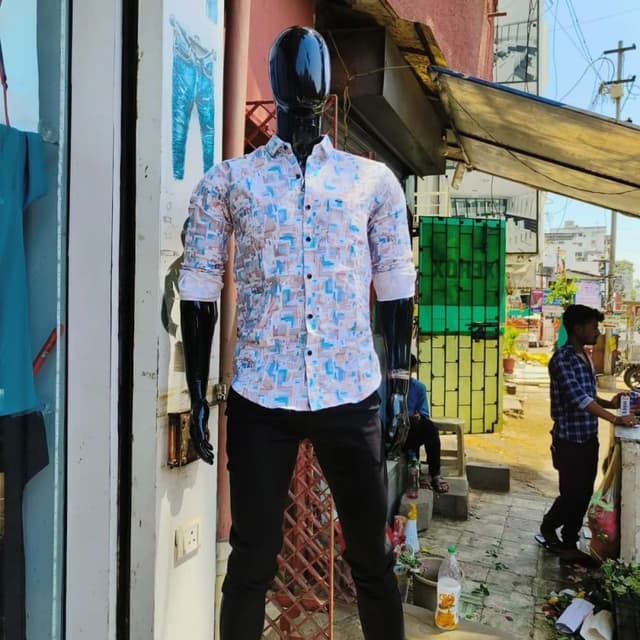 Light blue, white, brown Shirt