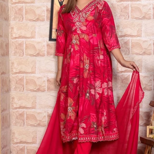 Red, with floral patterns in shades of pink, brown, and beige. Anarkali Suit