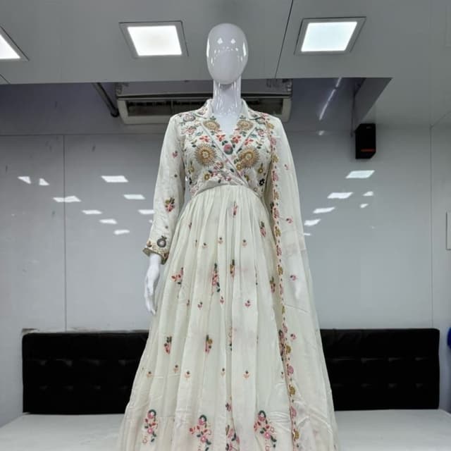 Ivory, with accents of pink, green, yellow, and gold Anarkali Dress