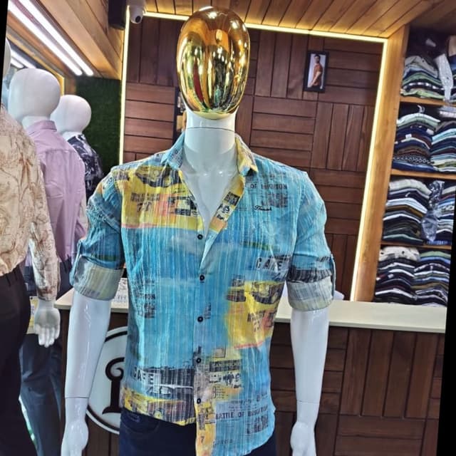 Blue, yellow, and white with a variety of other colors in the printed design. Shirt