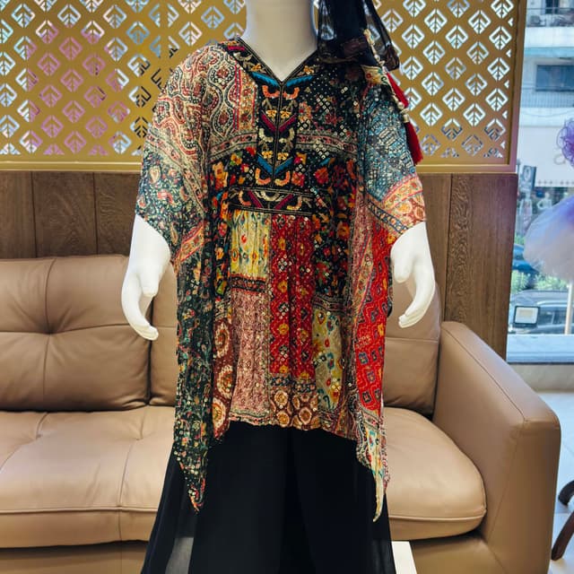 Multicolor, featuring reds, greens, blacks, yellows, and blues. Kaftan