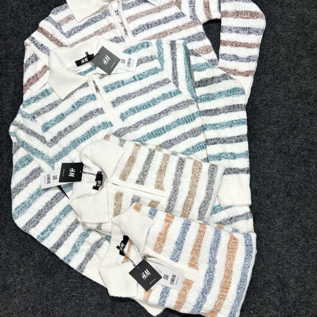 White, with stripes of blue, gray, and brown Sweater