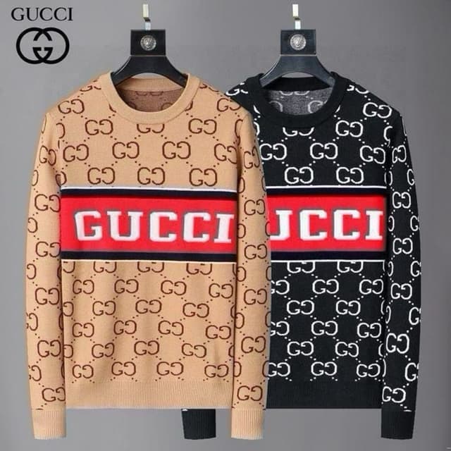 Beige and Black with Red and White accents Sweater