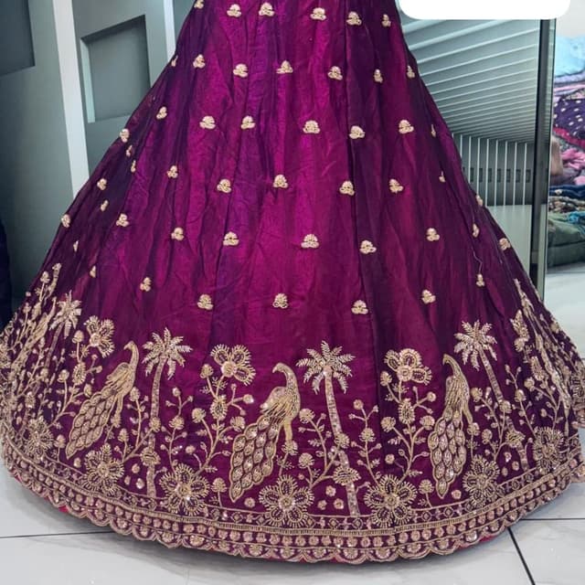 Deep purple with gold Lehenga