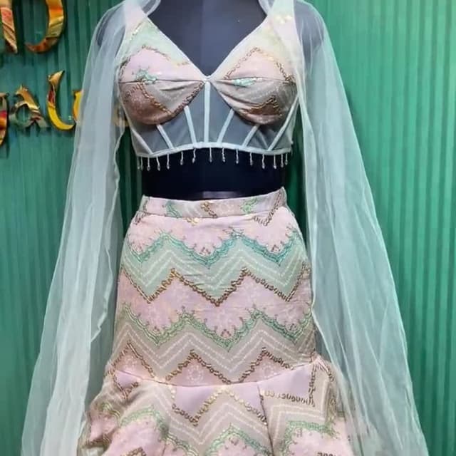 Soft pink, mint green, and gold Lehenga Choli