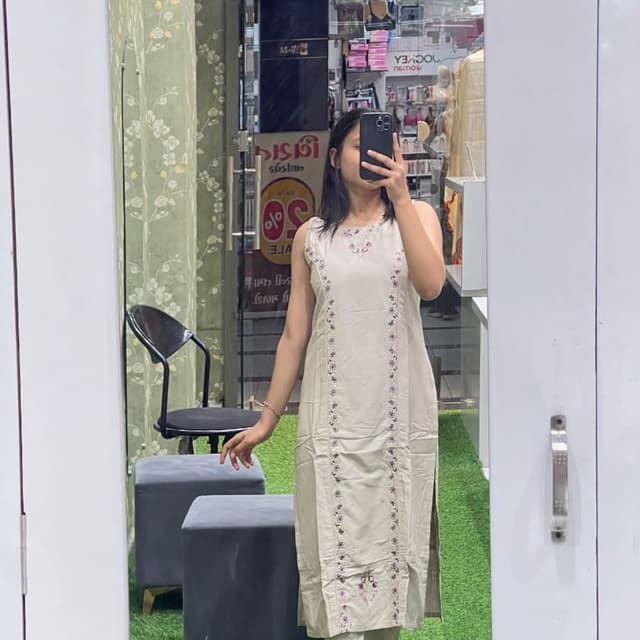 Light Beige with hints of Purple and Green Kurta with matching Pants