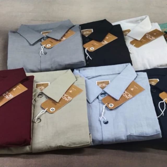 Various solid colors including black, gray, beige, and light blue Shirt