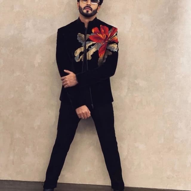 Black, Red, Gold Suit