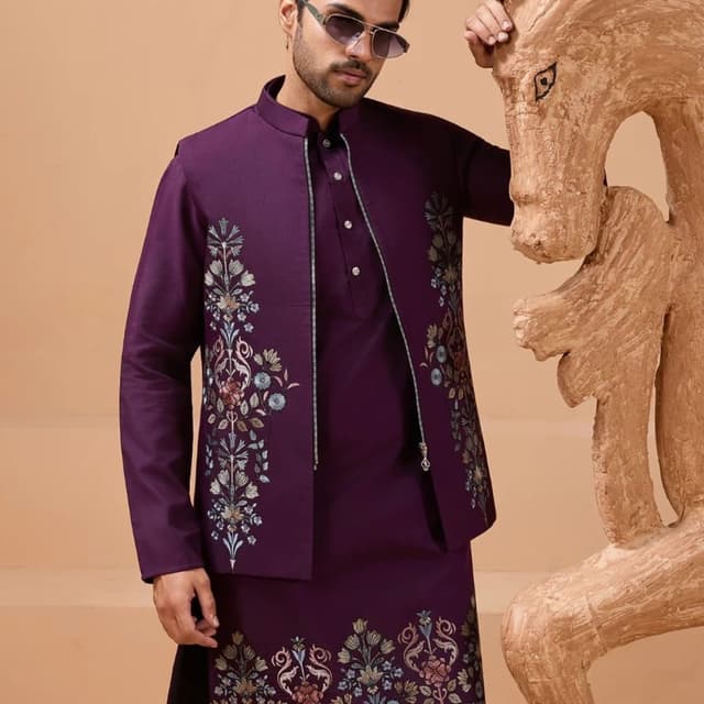 Deep Purple, with accents of gold, green, blue, and pink in the embroidery Jacket, Kurta, and Pants