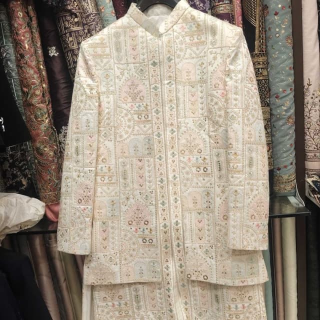 Ivory, pastel pink, and muted green Jacket