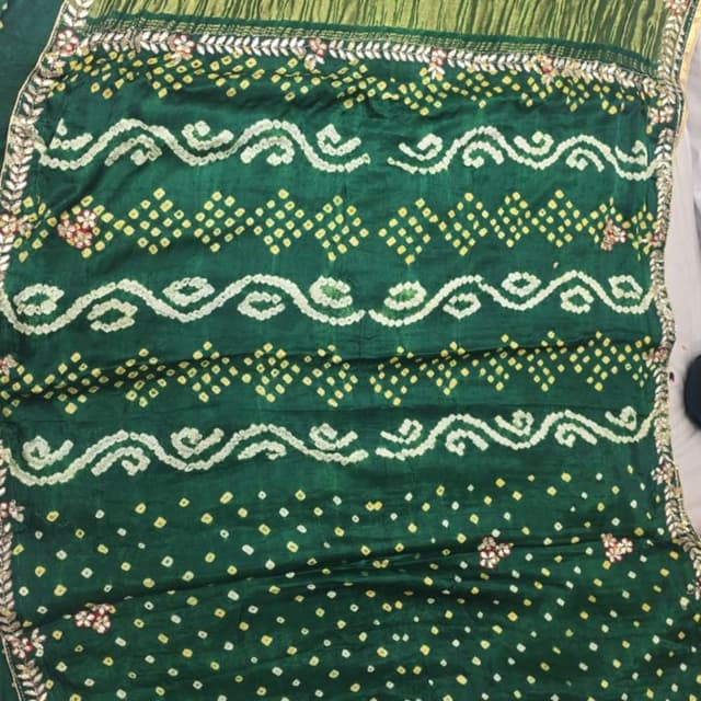 Green, yellow, white and gold Saree