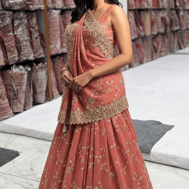 Coral Peach with Gold Lehenga Choli